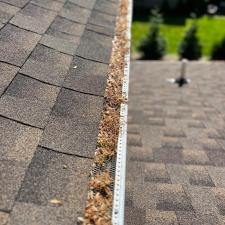 Tough-Gutter-Cleaning-with-Gutter-Guards-in-Montvale-New-Jersey 0