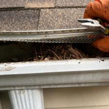 Tough-Gutter-Cleaning-with-Gutter-Guards-in-Montvale-New-Jersey 1